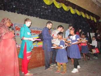 Hand out of educational gifts to children